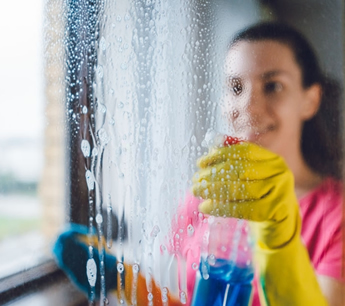 caregiver and elderly woman smiling